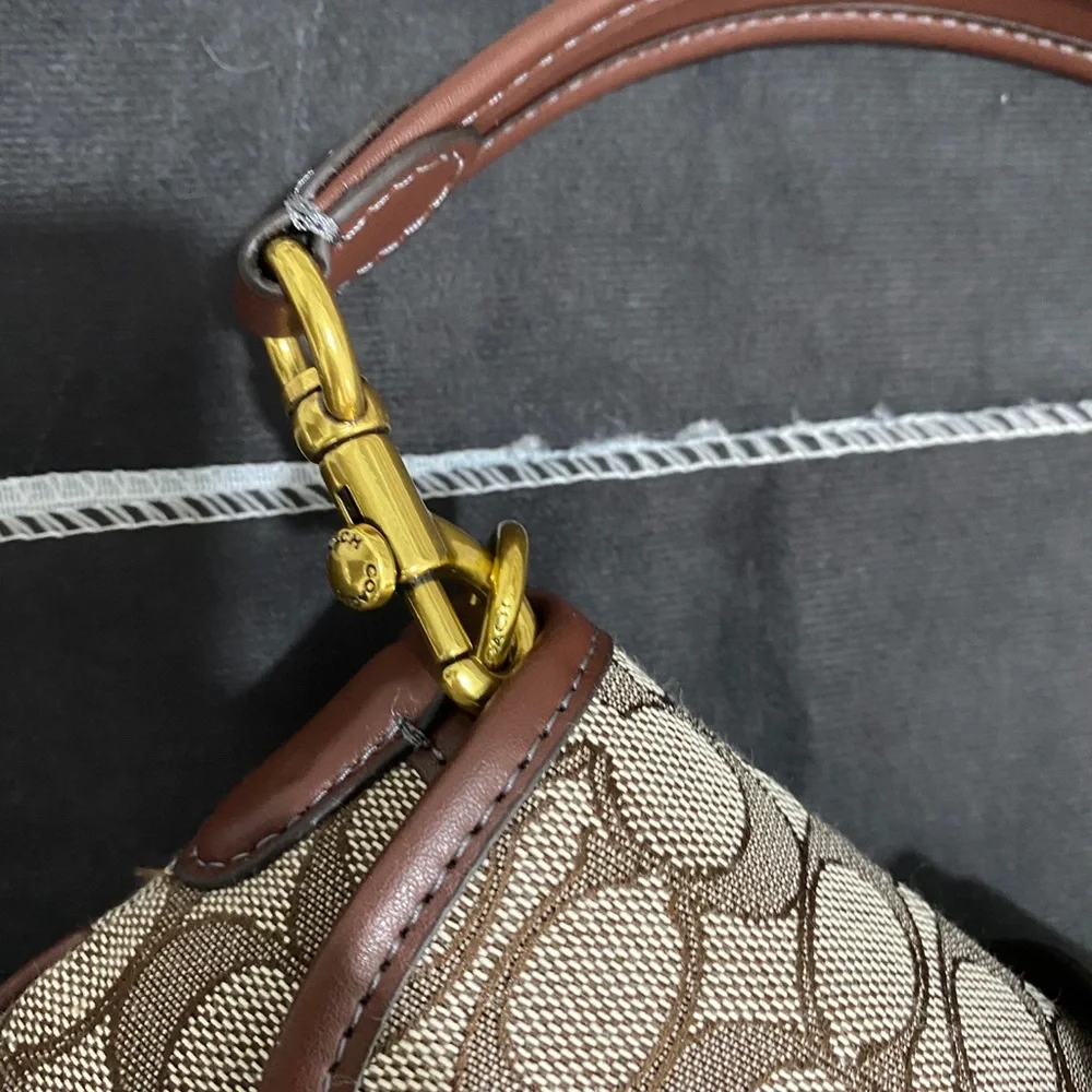 Coach Brown Signature Canvas Saddle Shoulder Bag with Gold Hardware